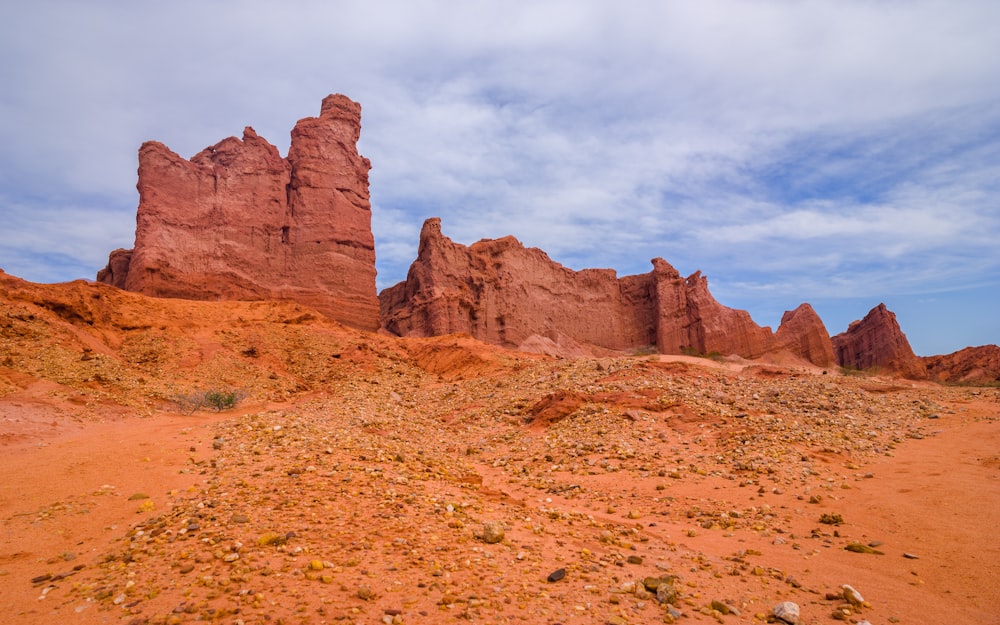 brown rock formation under blue sky during daytime