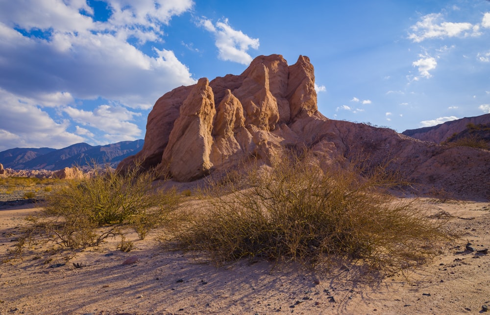 brown rock formation under blue sky during daytime