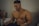topless man wearing silver watch