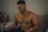 topless man wearing silver watch