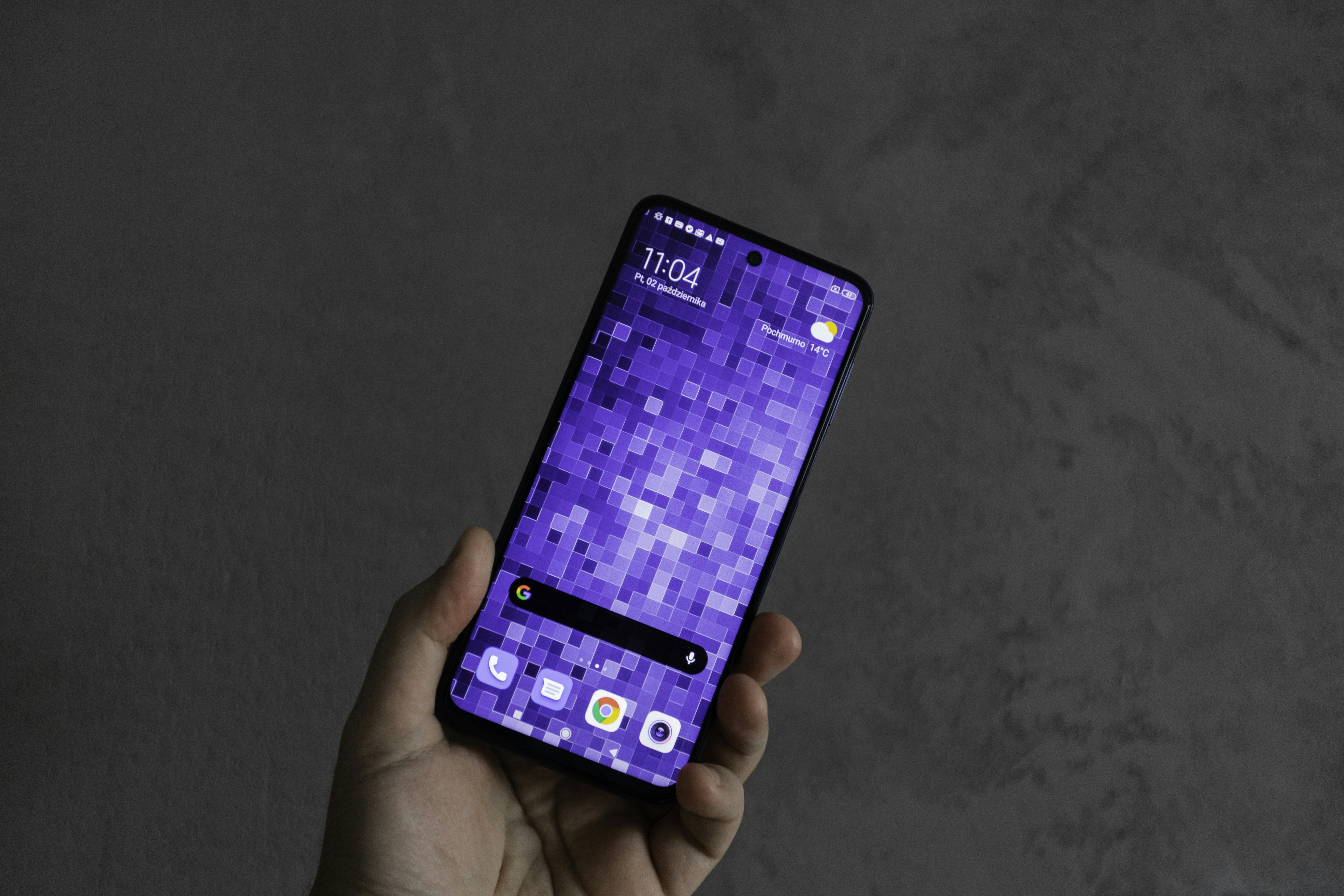 person holding black android smartphone