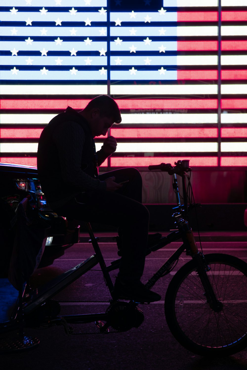 man in black long sleeve shirt sitting on black and gray wheel chair