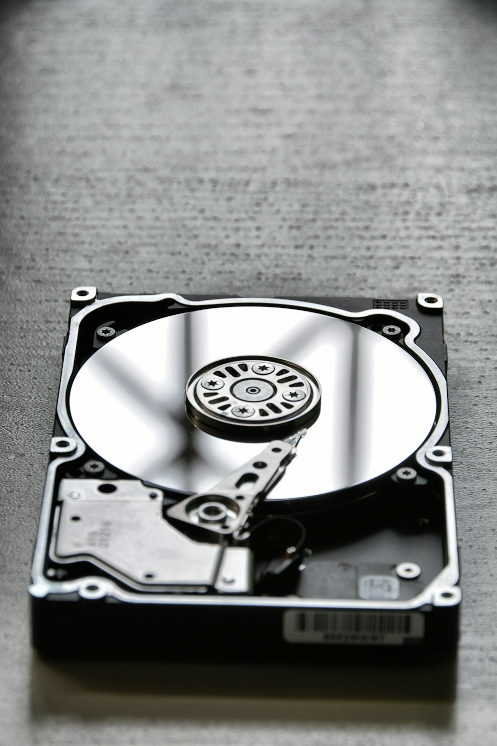 silver and black hard disk drive