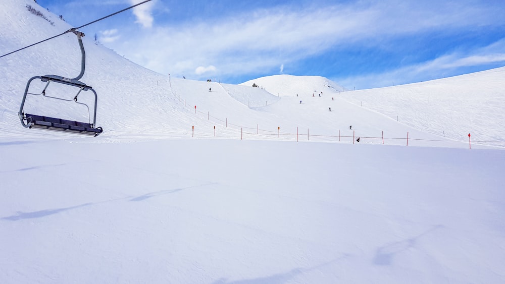 people walking on snow covered field during daytime