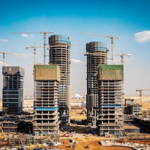 a group of tall buildings under construction