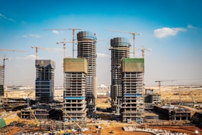 a group of tall buildings under construction
