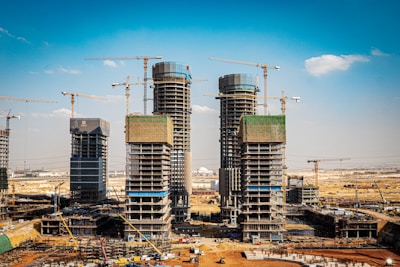 a group of tall buildings under construction