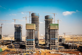 a group of tall buildings under construction