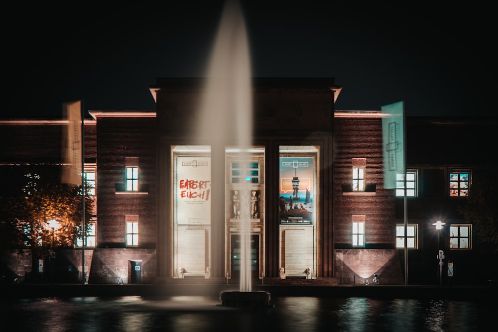 brown and white concrete building during nighttime