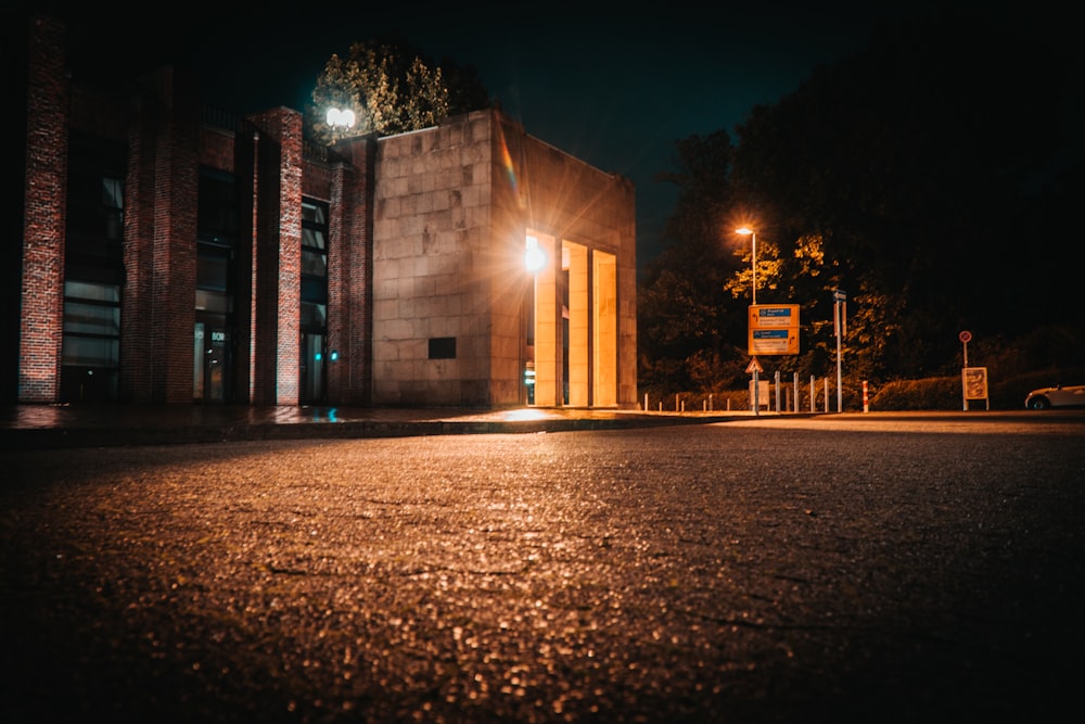 brown and white building during night time