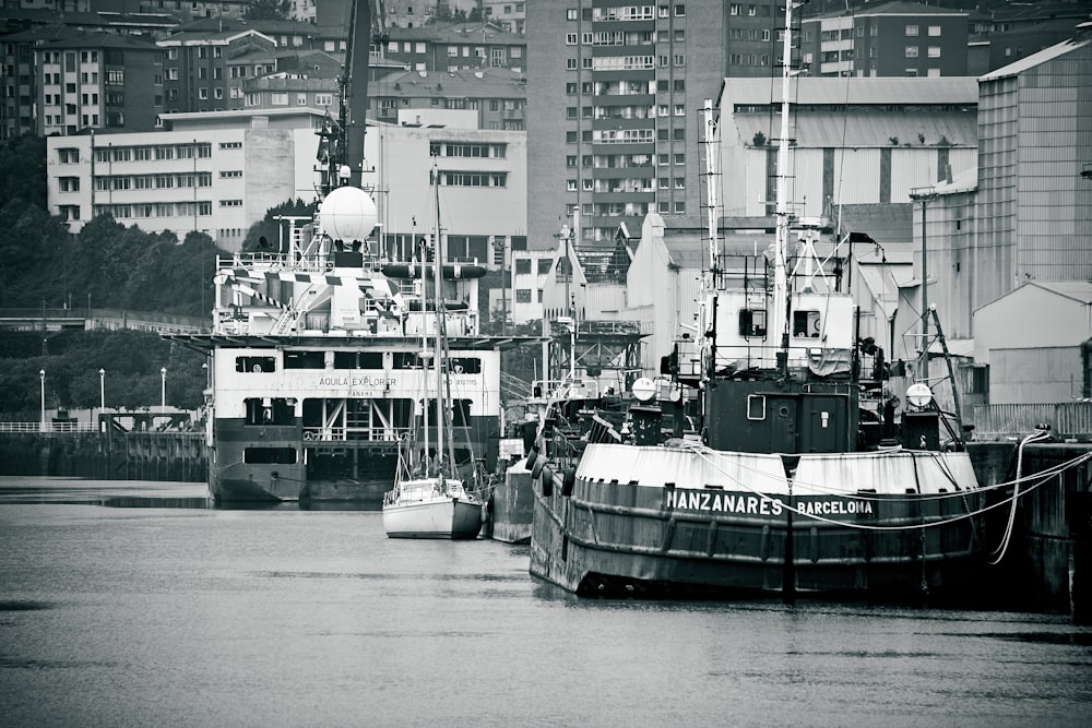 grayscale photo of boat on water