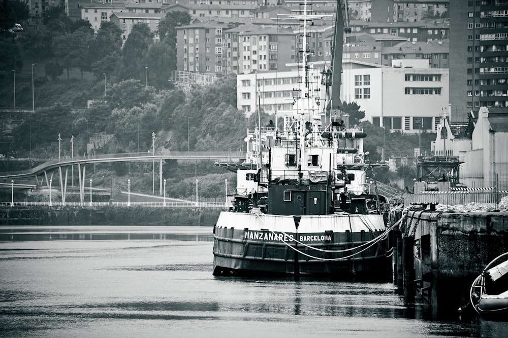 black and white ship on water