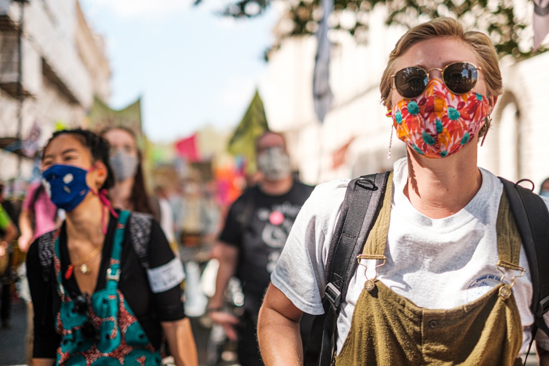 woman in white shirt wearing sunglasses, Extinction Rebellion September 2020 Protests for the launch of the Climate and 