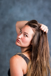 woman in black tank top