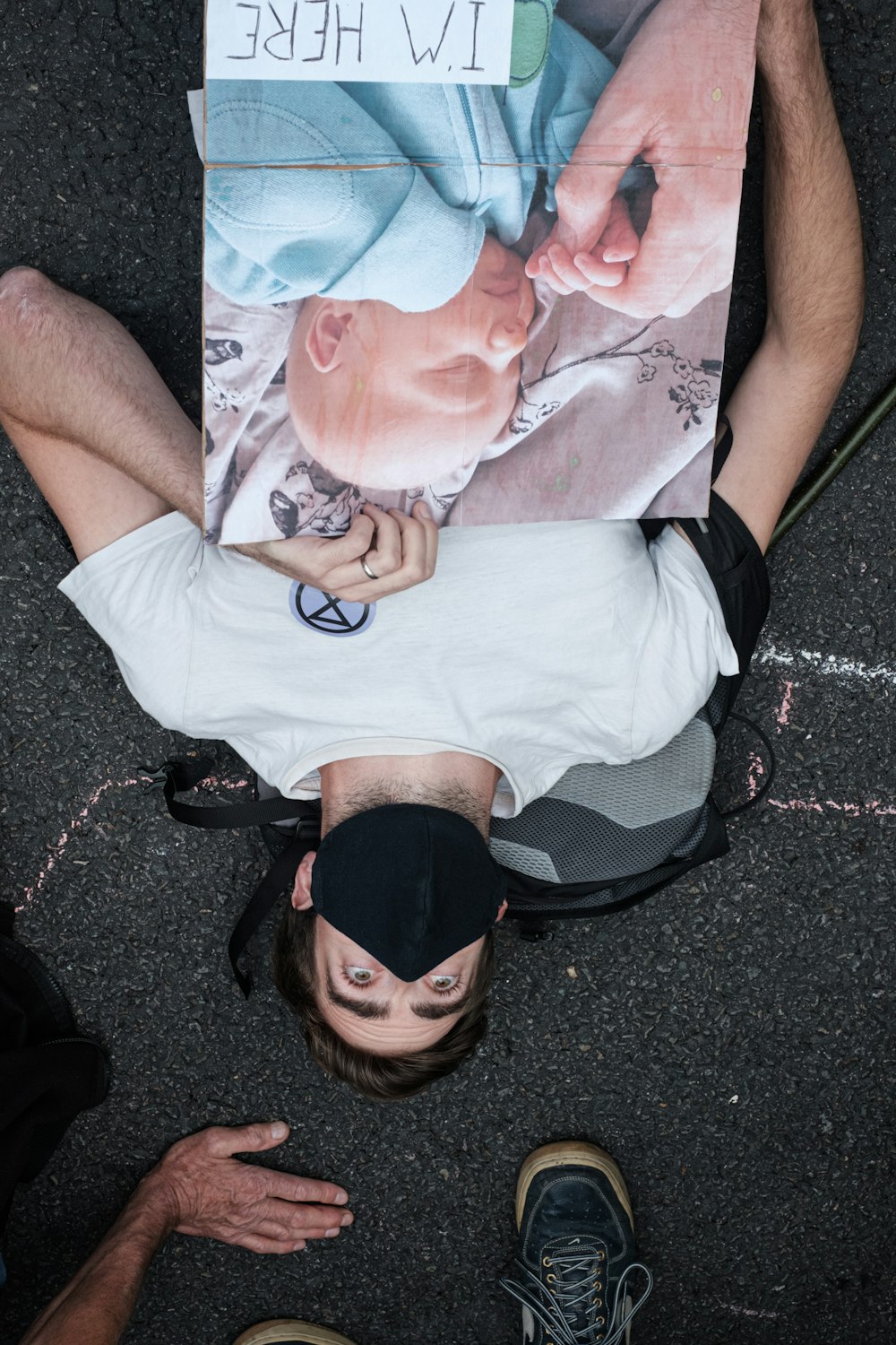 man in blue crew neck t-shirt and black shorts