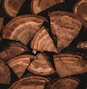 brown wooden log lot during daytime