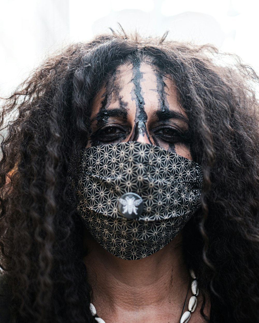 woman with black curly hair