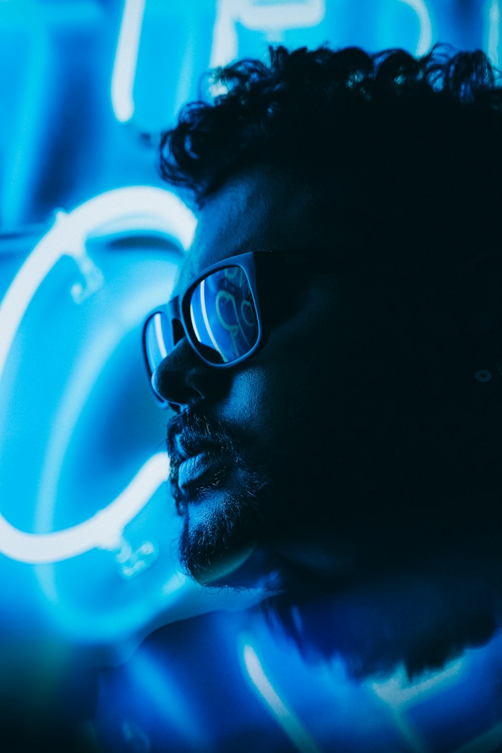 man wearing black framed eyeglasses