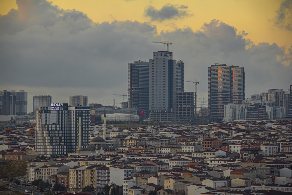 city buildings under cloudy sky during daytime