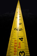 yellow and black measuring tape