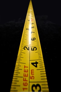 yellow and black measuring tape