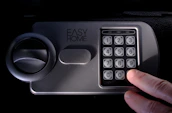 A customer happily accessing their storage unit with a secure keypad entry.
