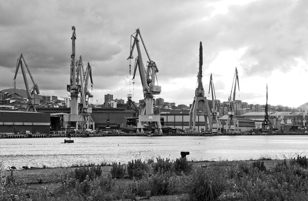 grayscale photo of a city with cars and buildings