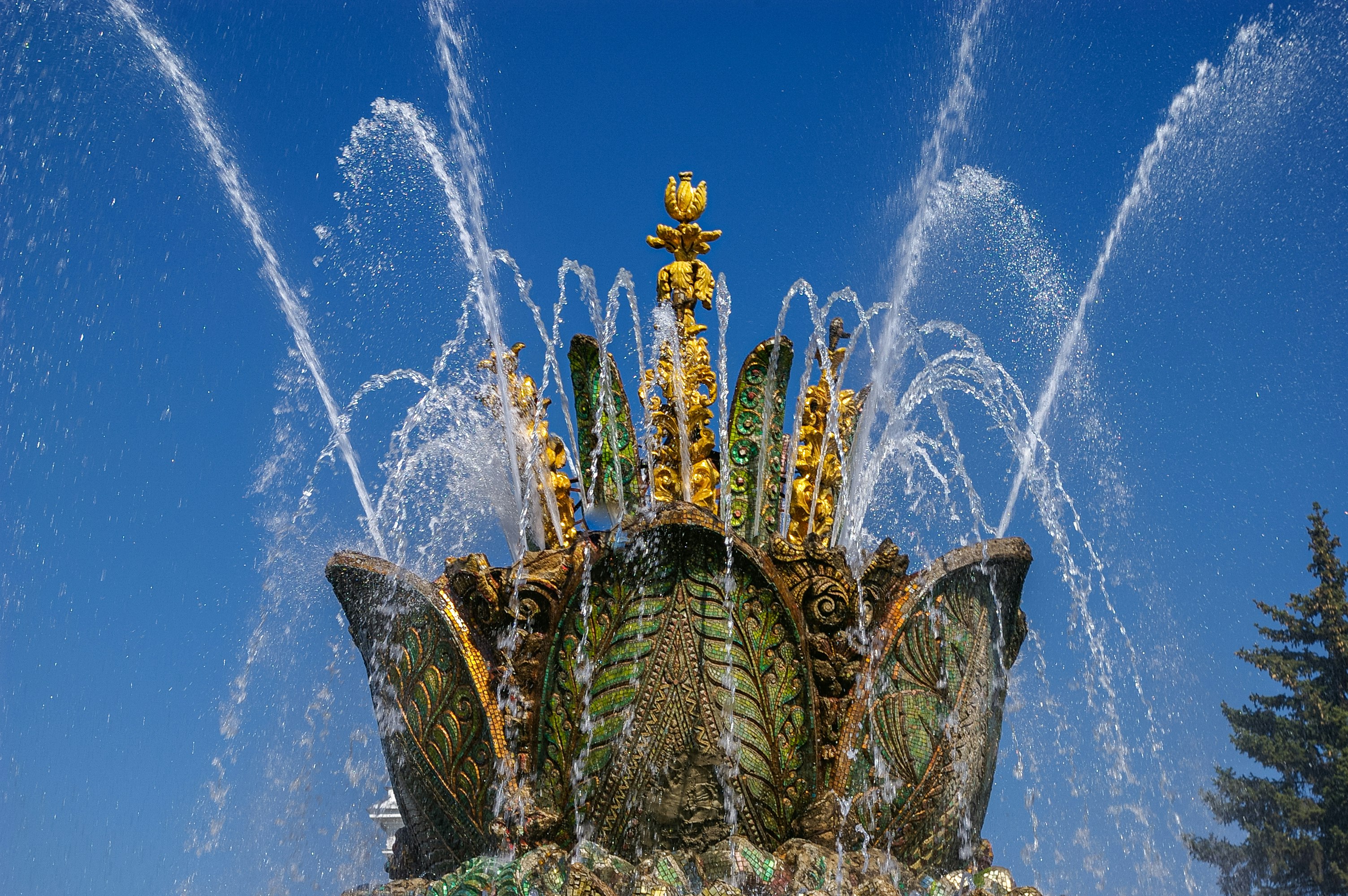 gold and blue water fountain