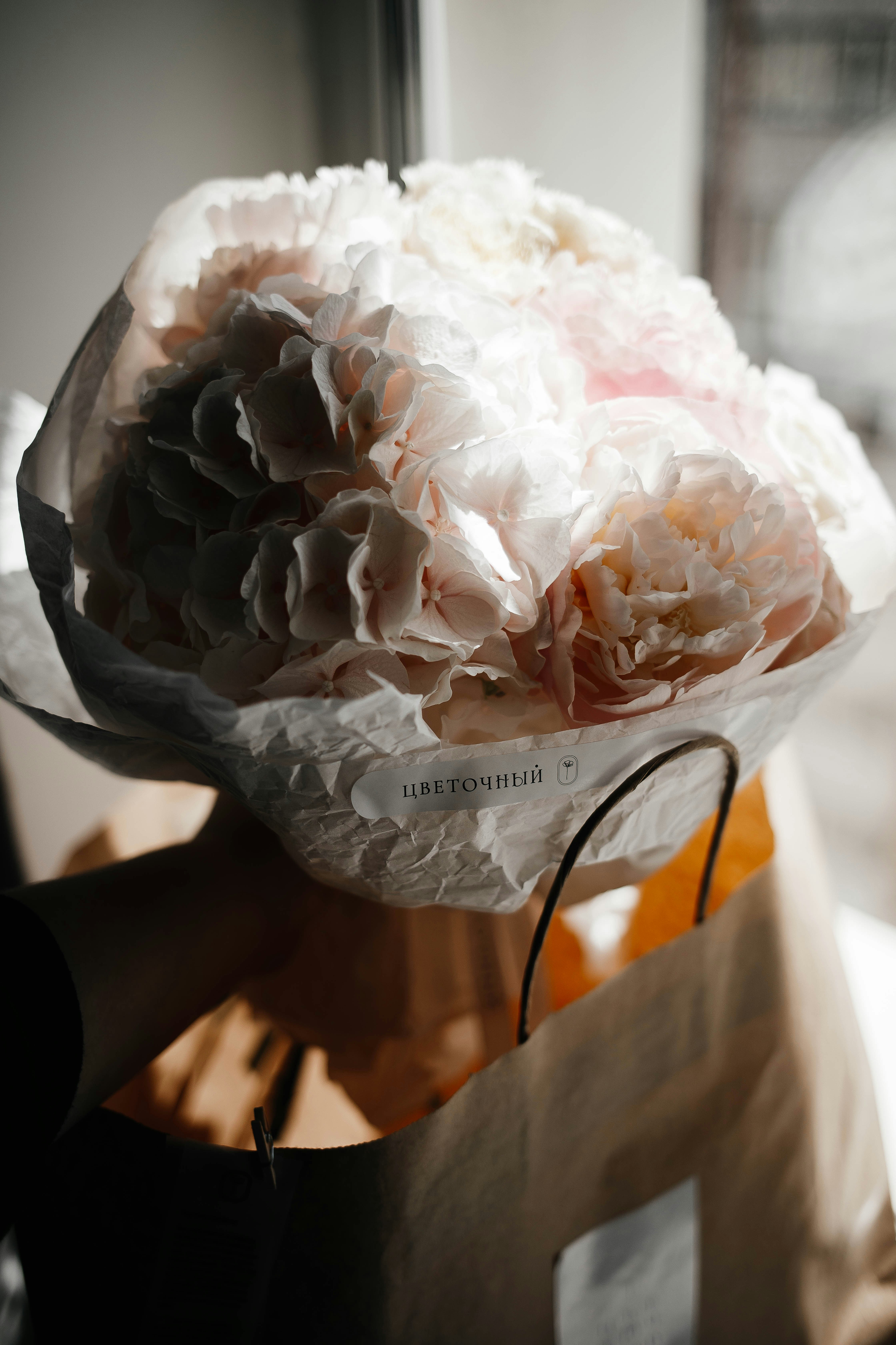 white and gray floral textile