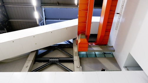 Modern industrial gypsum ceiling installation in a spacious commercial building.