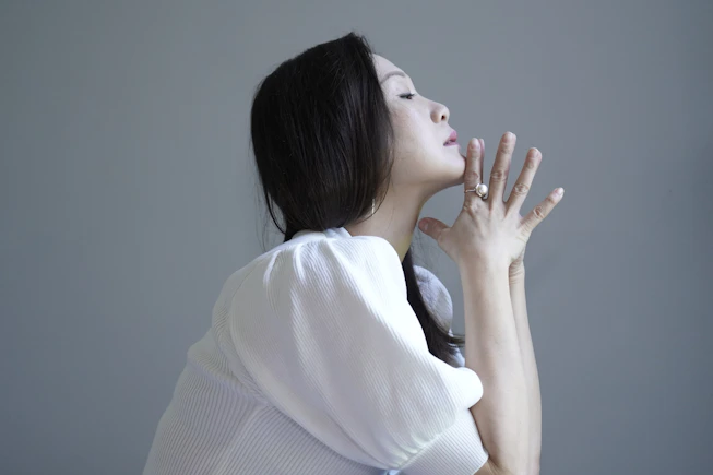 woman in white knit sweater