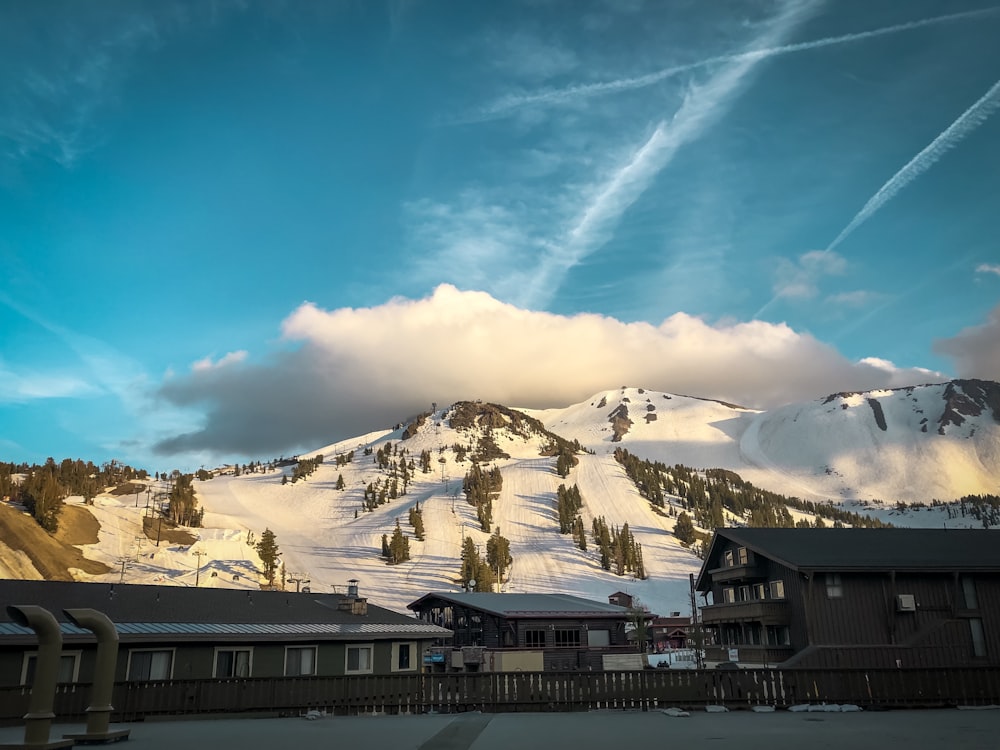 snow covered mountain under blue sky during daytime