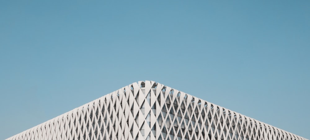 white concrete building under blue sky during daytime