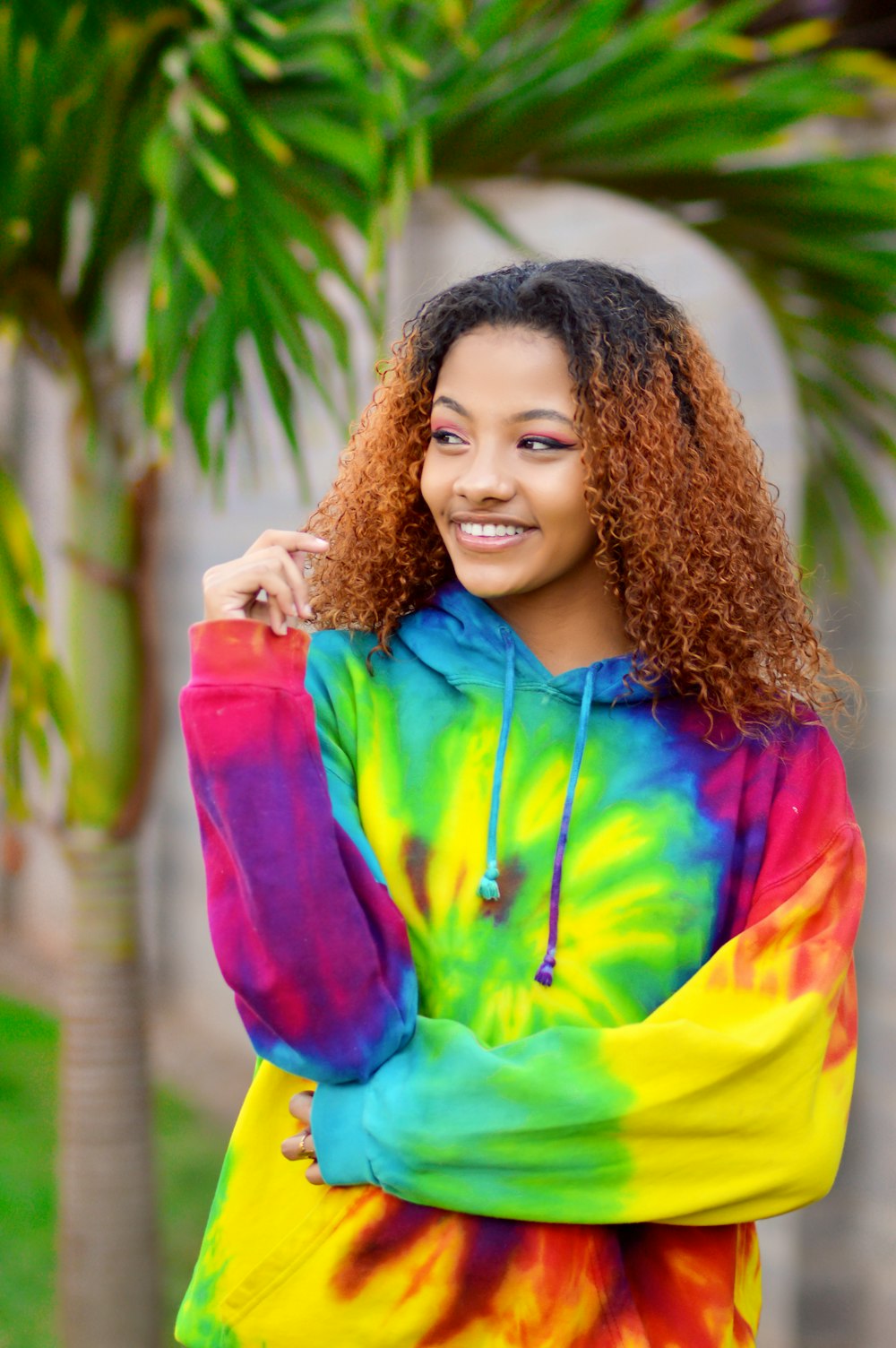 girl in blue zip up jacket smiling