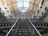 Interior view of a spacious mezzanine supported by metal structures.