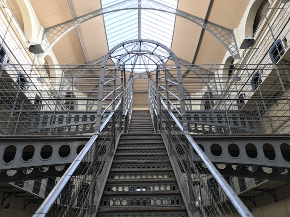 Interior view of a spacious mezzanine supported by metal structures.