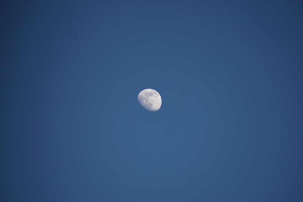 full moon in blue sky