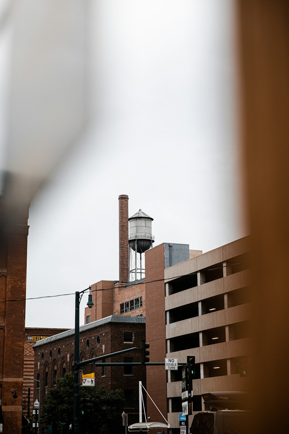 brown concrete building under white sky during daytime