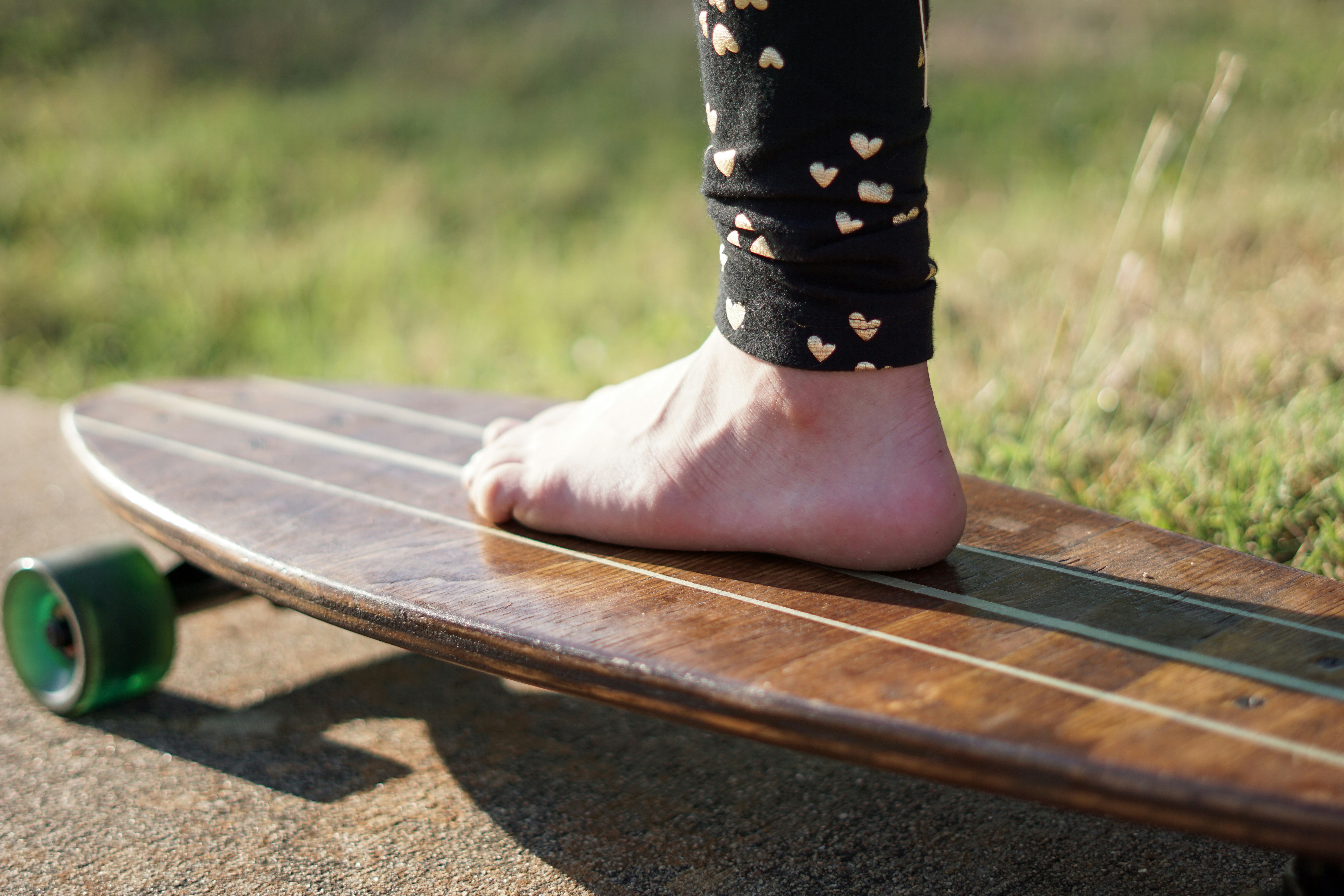 A person’s foot on a skateboard