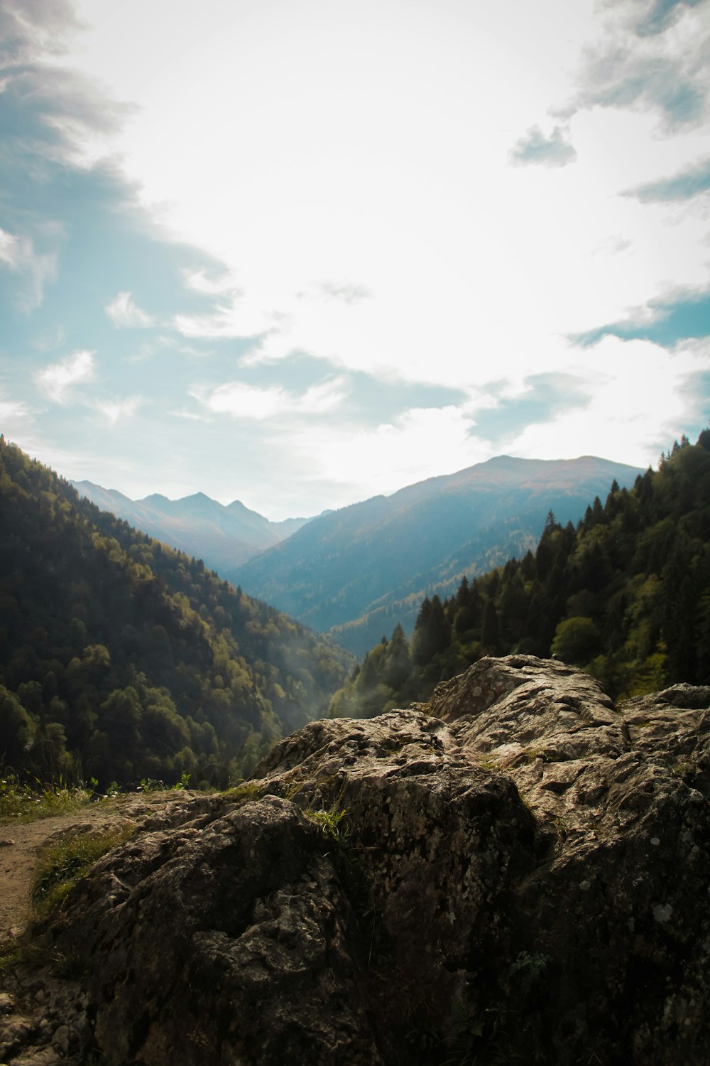 green mountains under white clouds during daytime