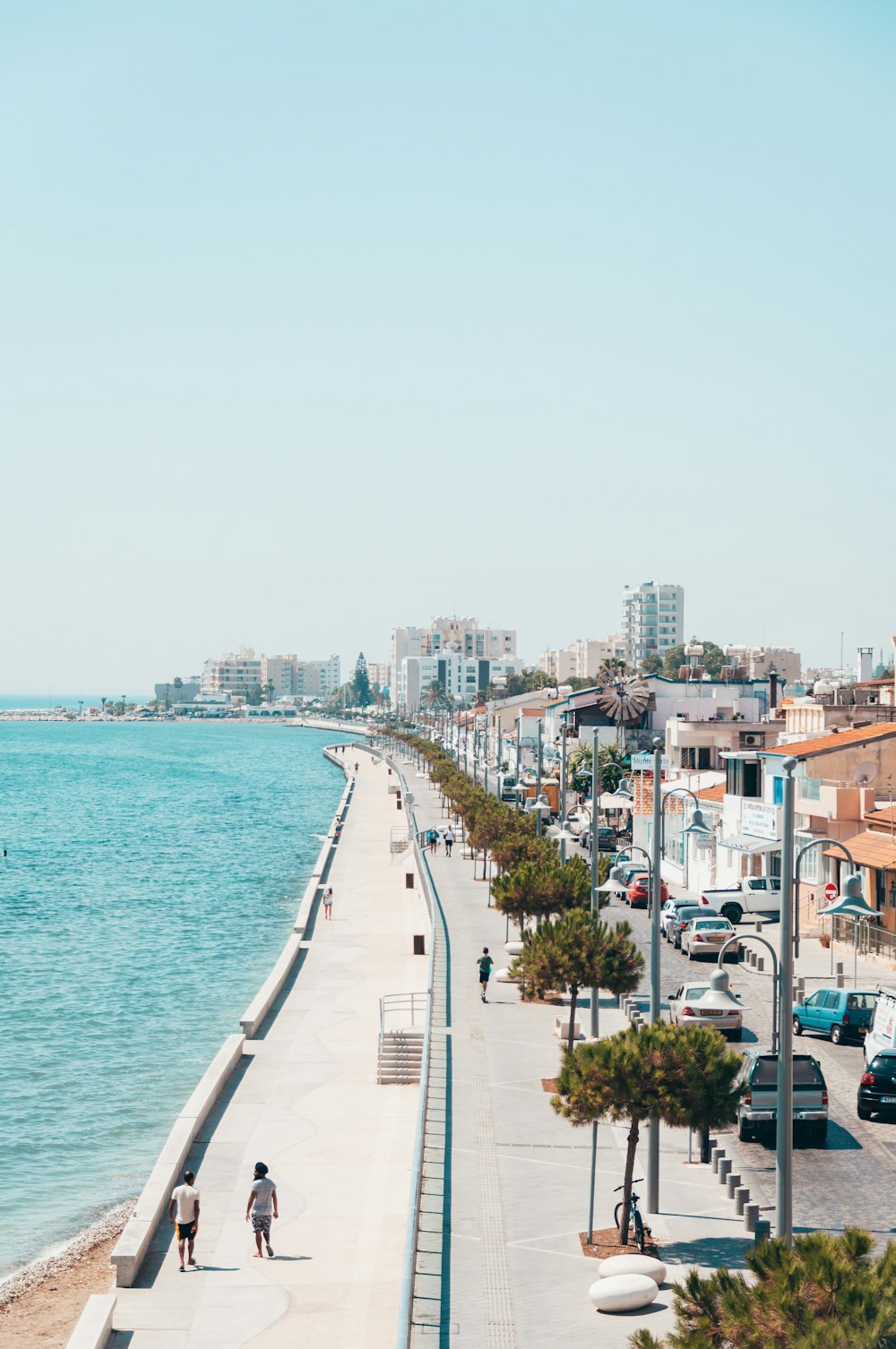 city buildings near body of water during daytime