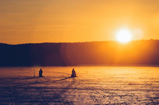 Ice fishing on frozen Lake Couchiching, lake stats section.