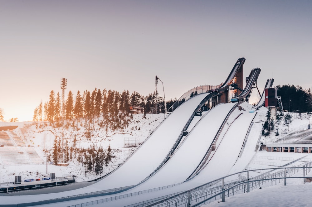 snow covered bridge during daytime