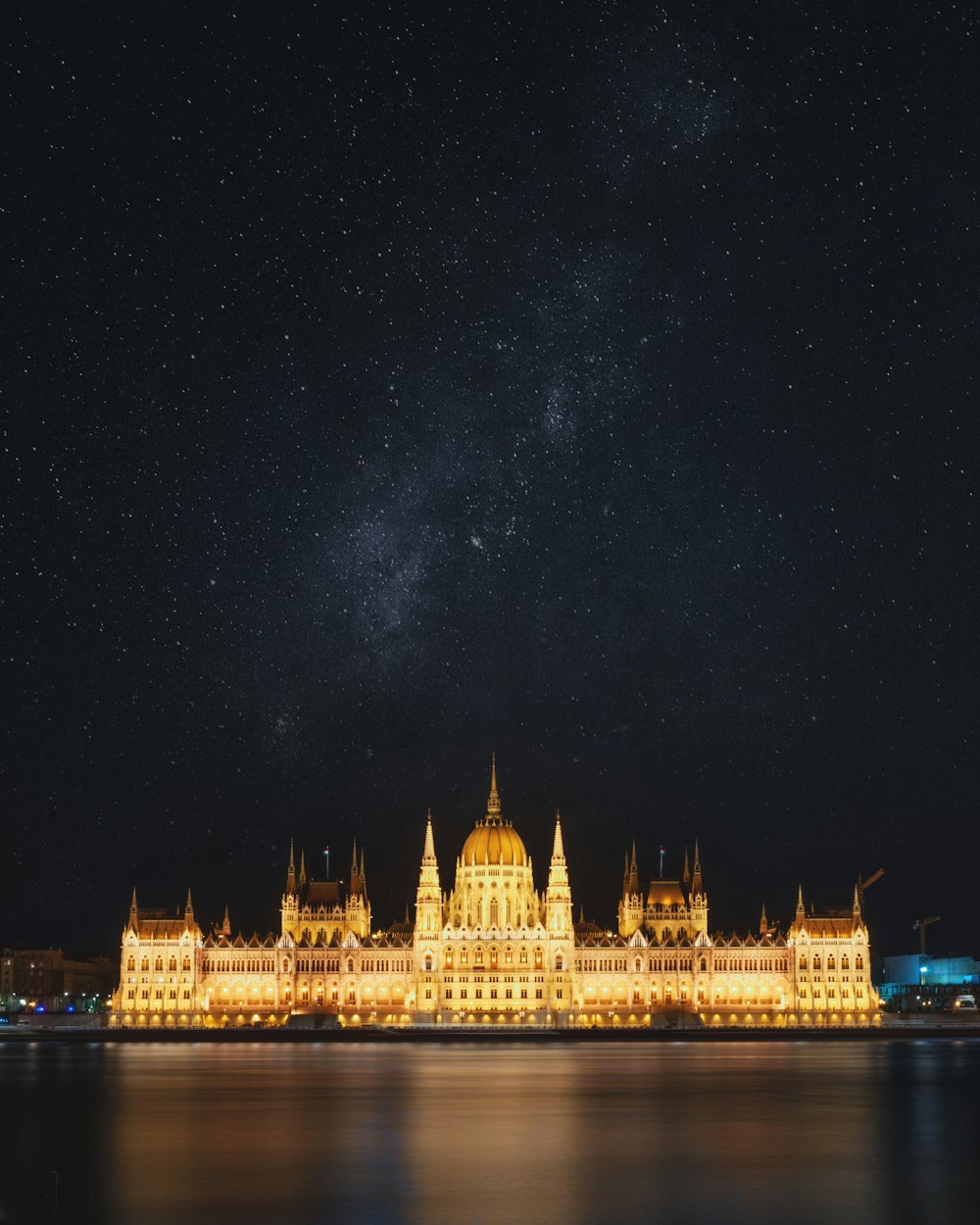 brown concrete building under starry night