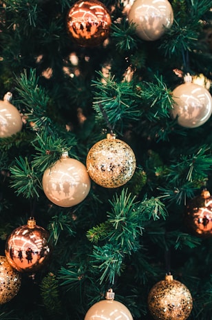 silver baubles on green christmas tree