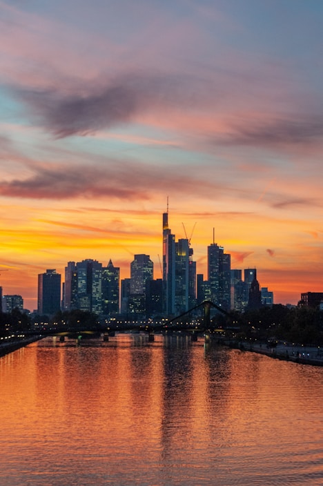 city skyline during sunset with bridge