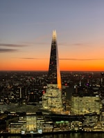 high rise building during sunset