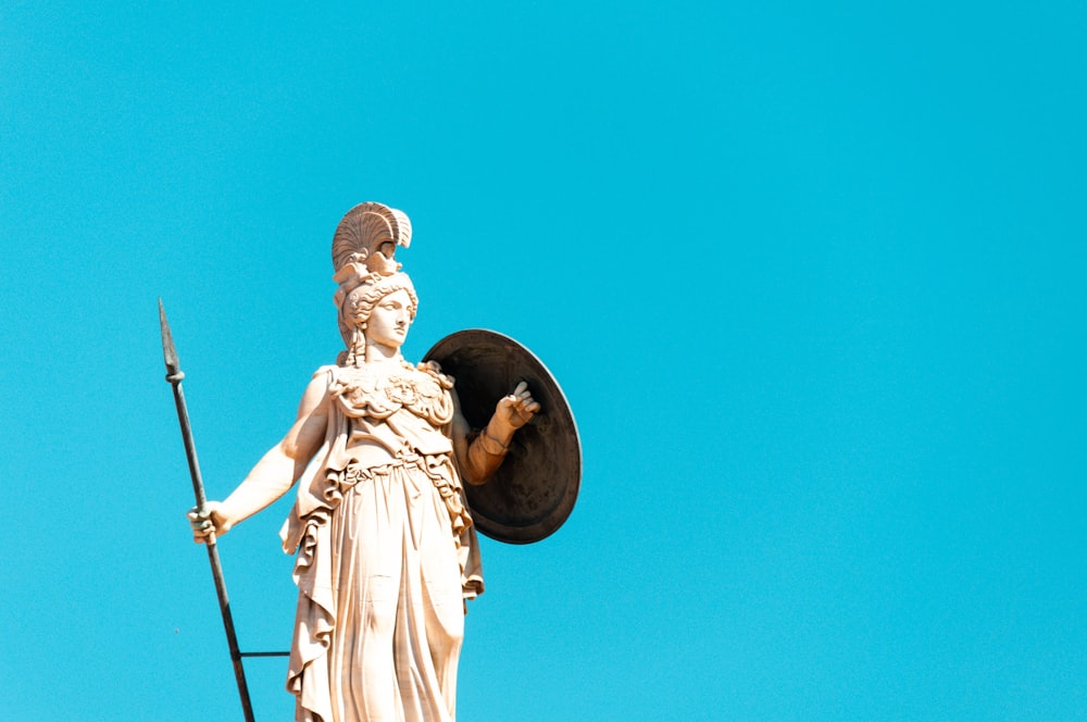 angel statue under blue sky during daytime