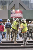 group of men in yellow hard hat and yellow hard hat