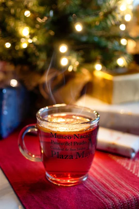 A cozy mug featuring a personalized photo and text, steaming with fresh coffee inside.